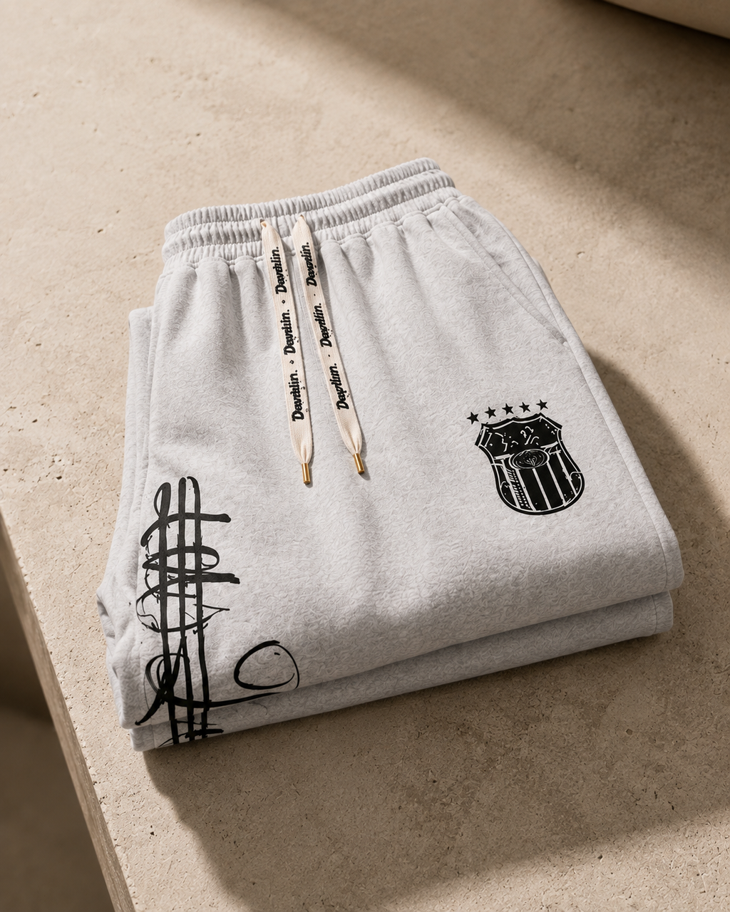 Auren Urban Script Wide-Leg Sweatpants folded product photograph
