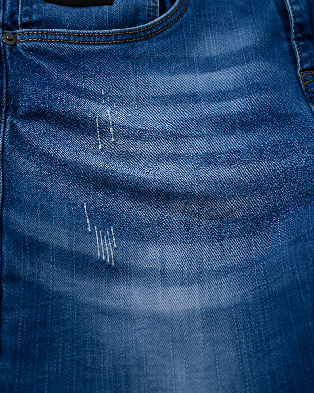 Auren Milano denim texture and distressed detail